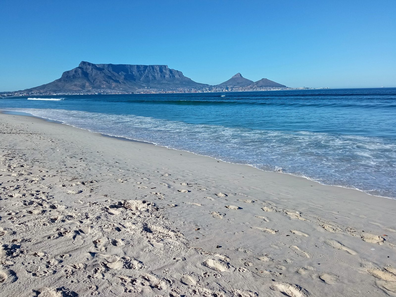 Table Mountain seen across the bay from Blouberg beach