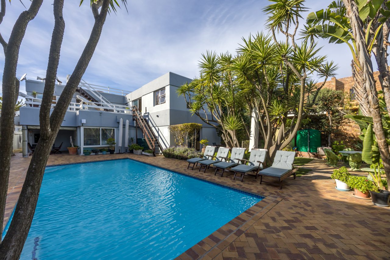 Pool Area at Secret Garden Guesthouse in Bloubergstrand