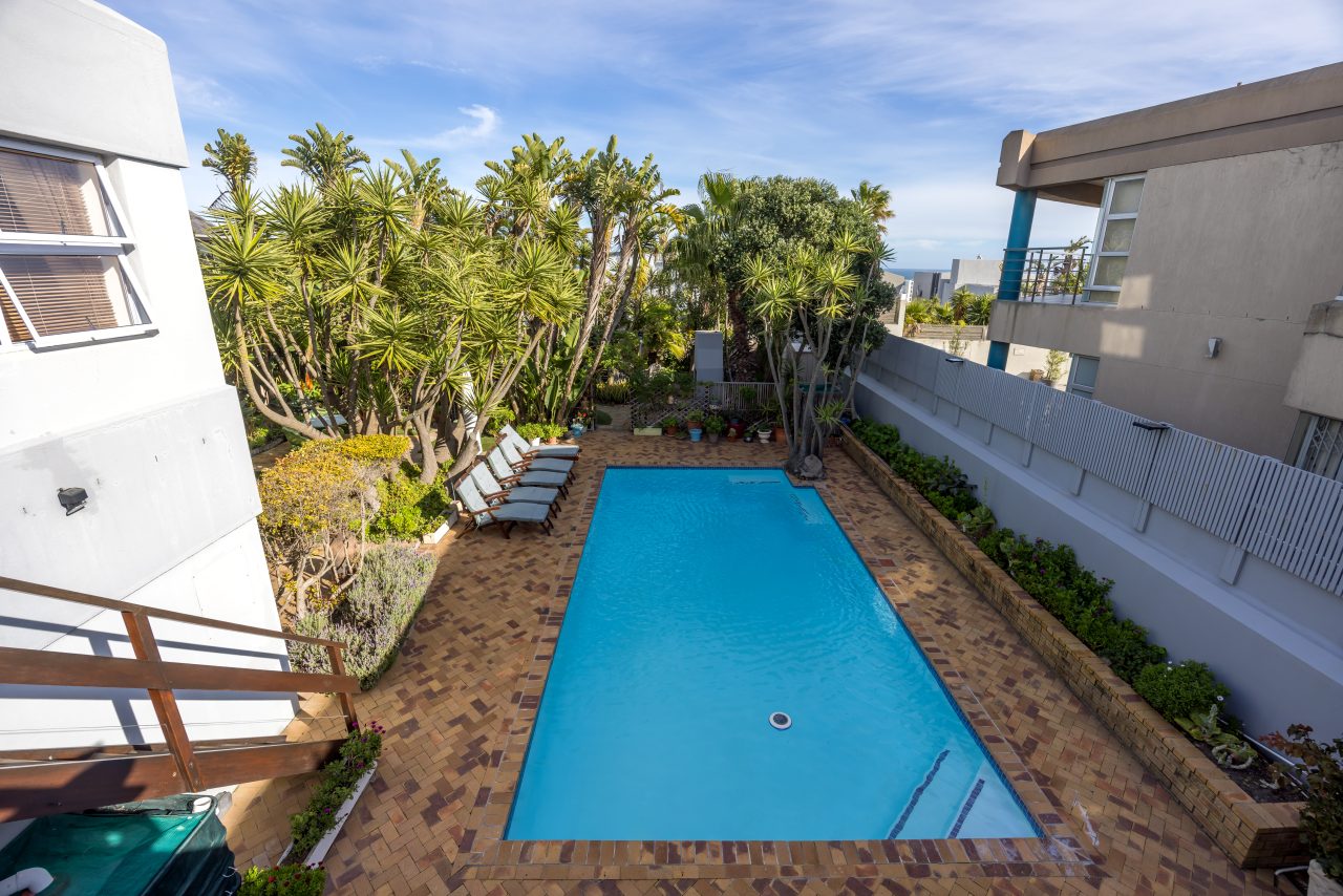 Pool Area at Secret Garden Guesthouse in Bloubergstrand