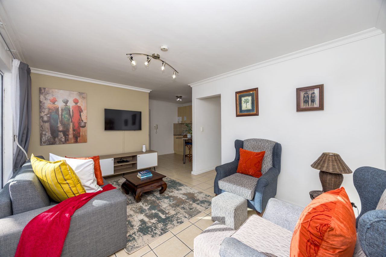 Protea Luxury King Suite with Sofa Bed at Secret Garden Guesthouse