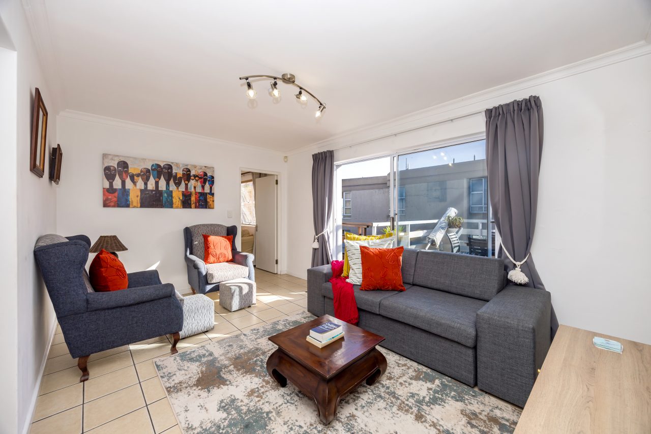 Protea Luxury King Suite with Sofa Bed at Secret Garden Guesthouse