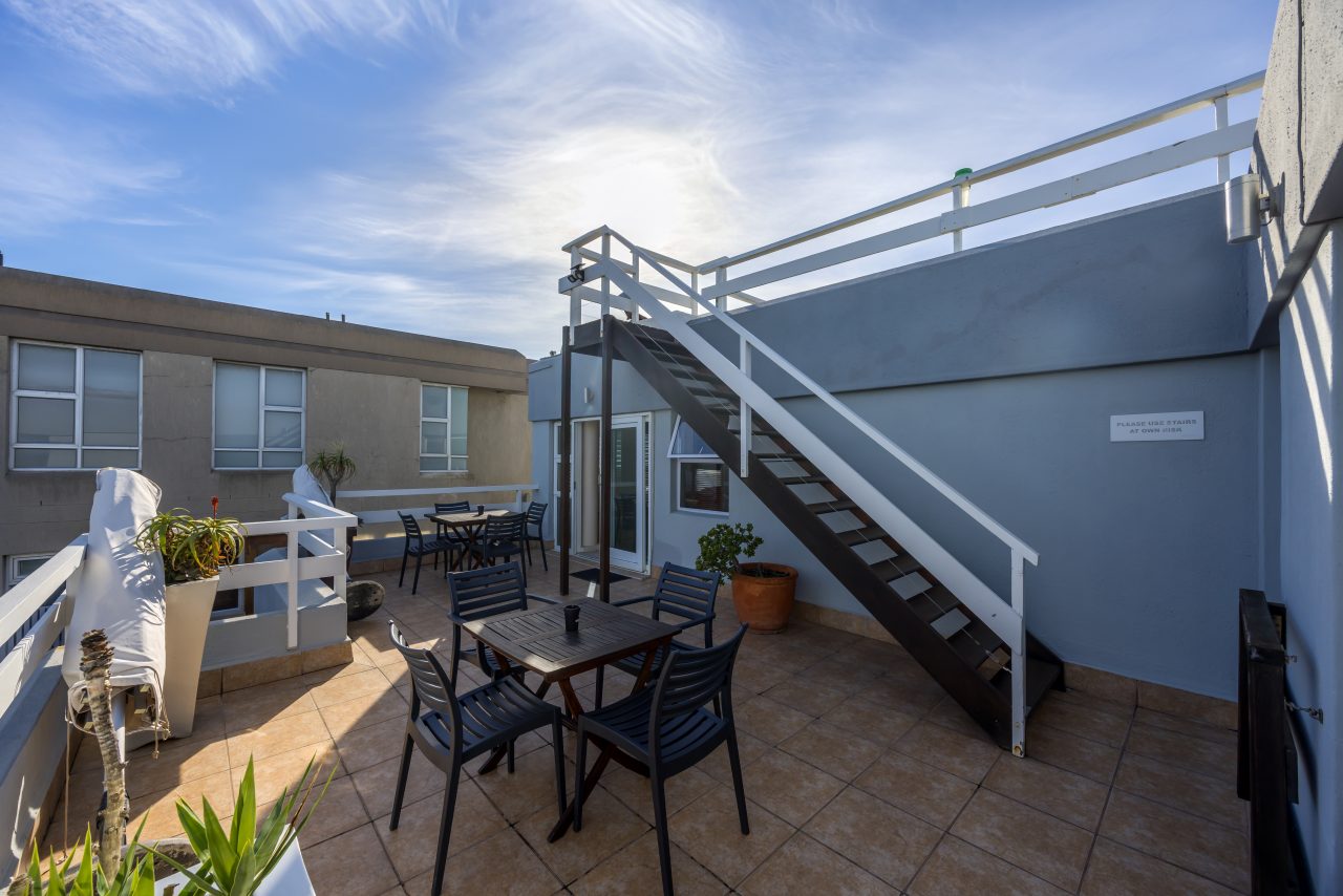 Protea Luxury King Suite with Sofa Bed at Secret Garden Guesthouse